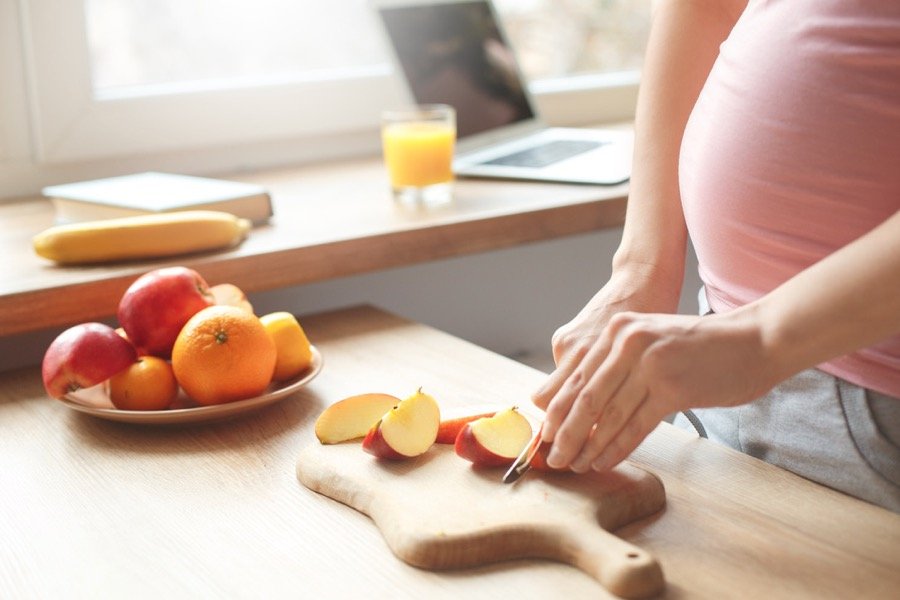 Pregnant woman in kitchen_Dietitians On Demand