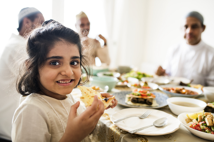 Diverse family enjoying a meal_Dietitians On Demand
