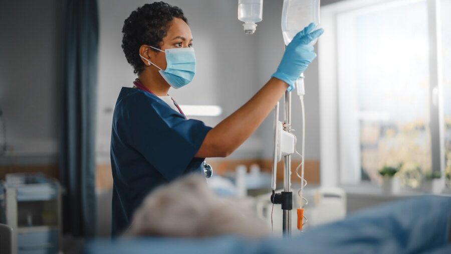 nurse hanging TPN