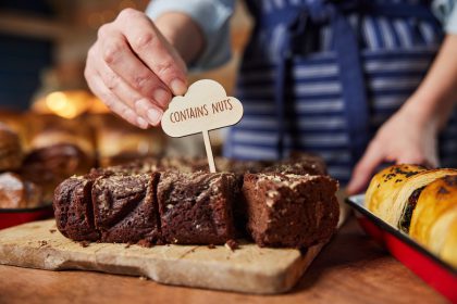 Baker labeling foods for food allergies and food intolerances