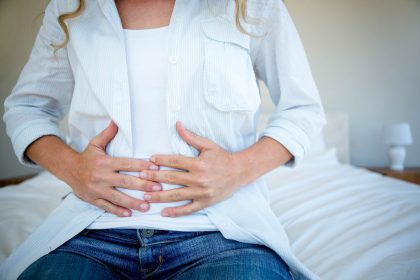 woman holding stomach_Dietitians On Demand