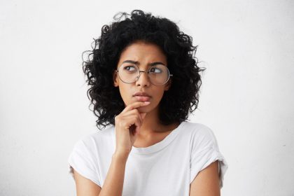 woman with hand on chin questioning_Dietitians On Demand